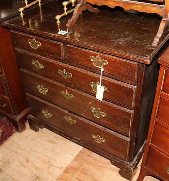 A George III oak chest, W.2ft 7in. D.1ft 5in. H.2ft 7in.